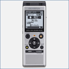 A silver digital voice recorder, turned on, with screen and controls facing the viewer, available to students, faculty, and staff.
