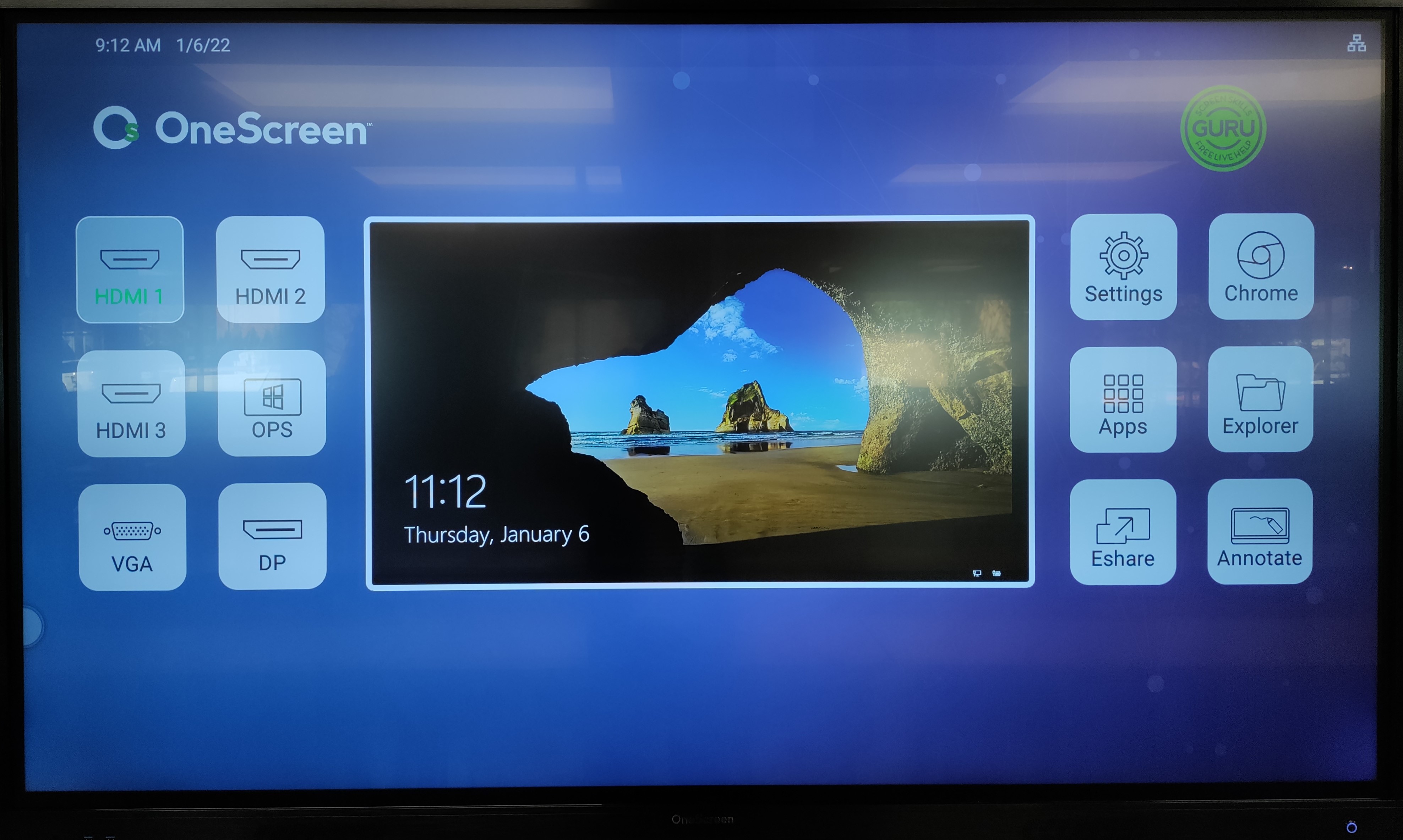 Photo of the OneScreen, active, with the apps displaying on either side of an image of a lock screen.